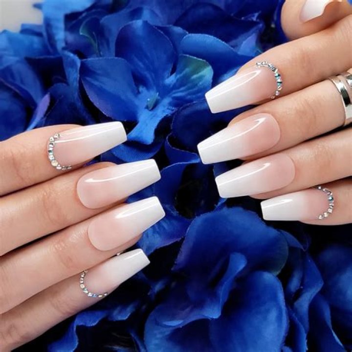 Elegance Redefined: The Allure of White Ombre Coffin Nails